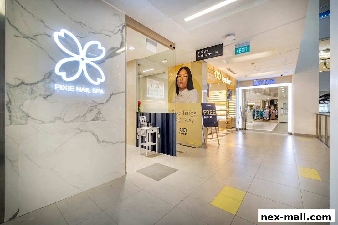 The entrance to Pixie Nail Spa, with a glowing sign and a clean, modern aesthetic.