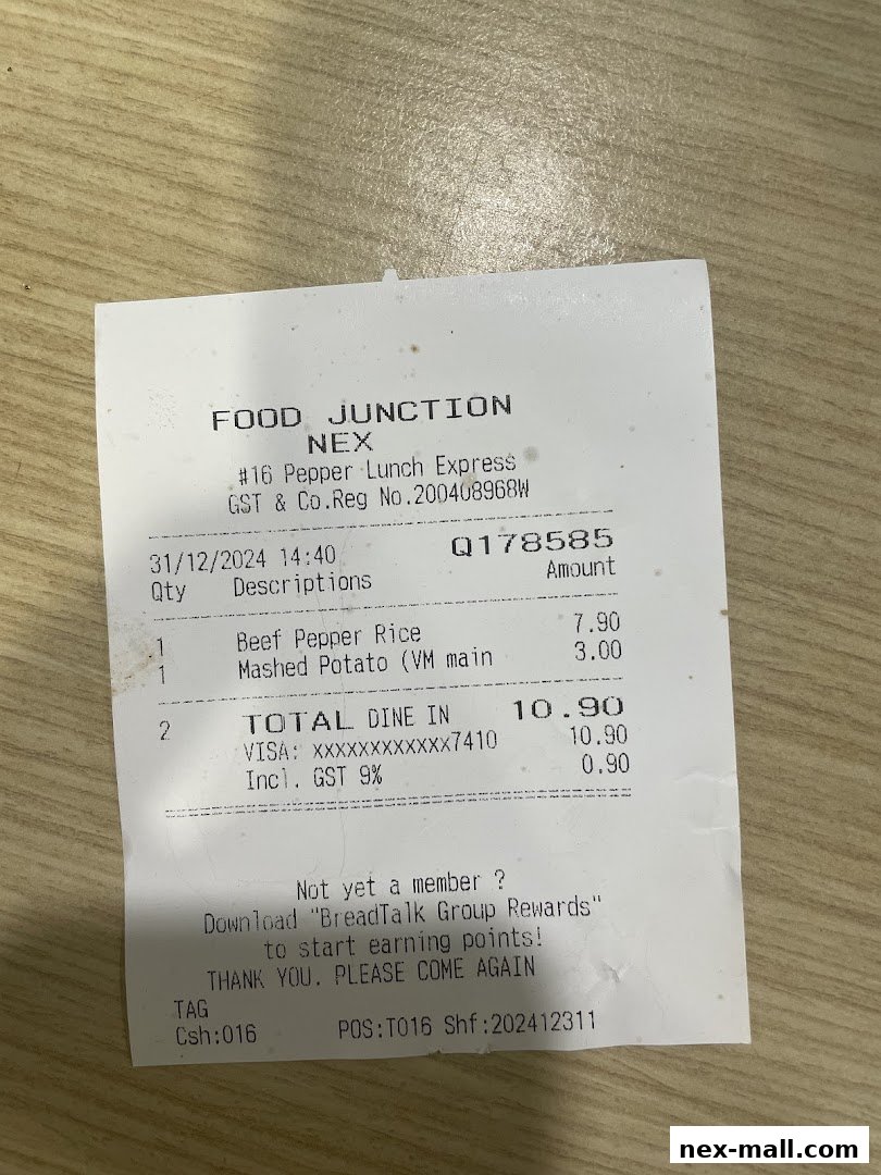A receipt from Pepper Lunch Express showing a purchase of Beef Pepper Rice and Mashed Potato.