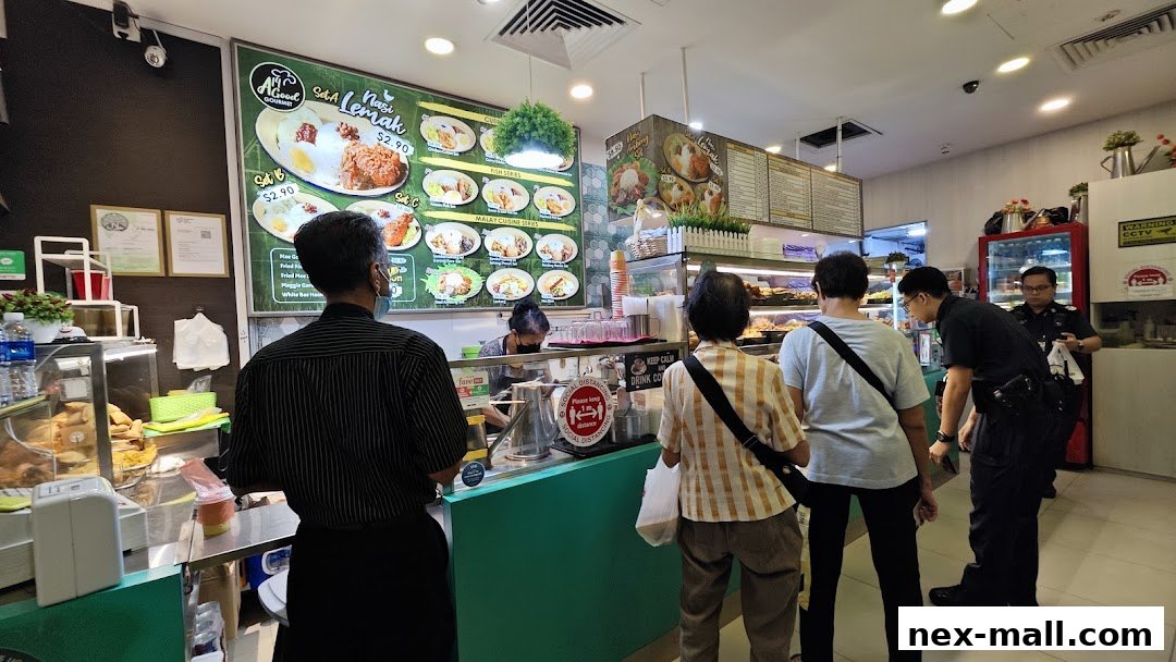 Customers queue at a food stall with a menu board displaying various meal sets.