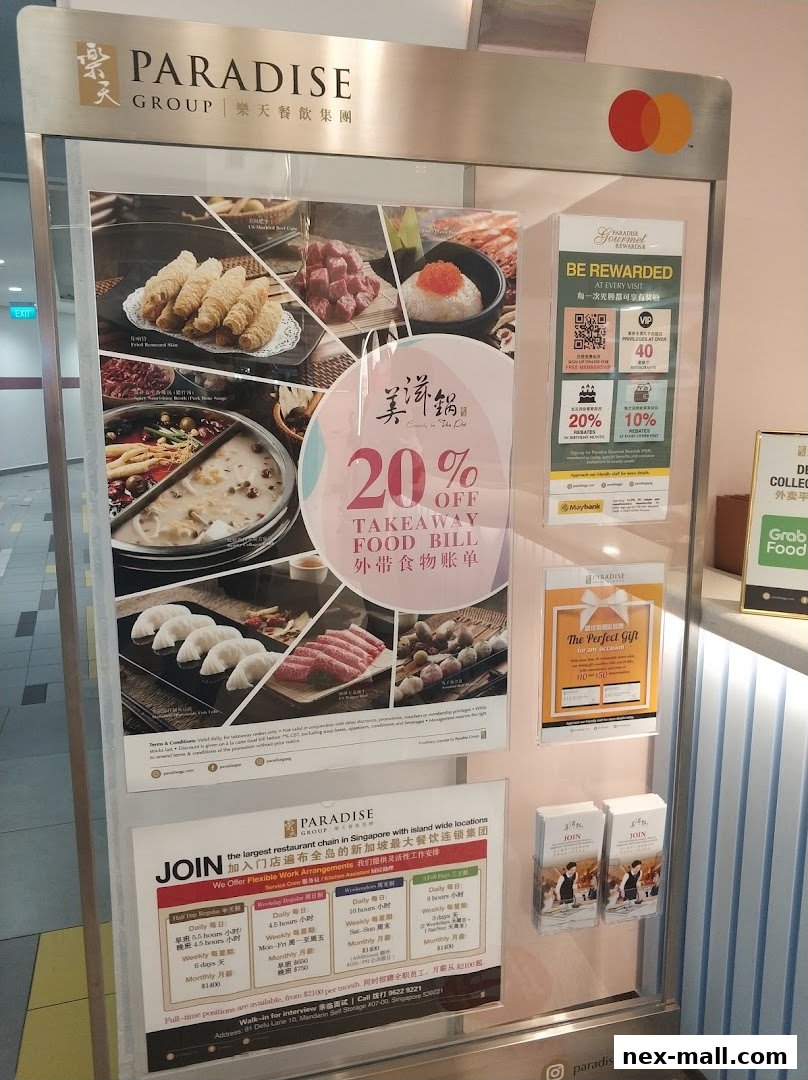 A display board for Beauty in The Pot at NEX, featuring food images and promotions.