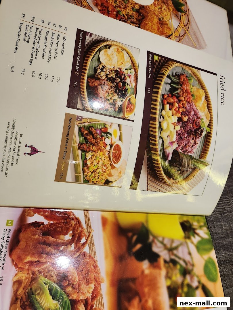 A menu from Bali Thai NEX featuring various rice dishes and fried items.