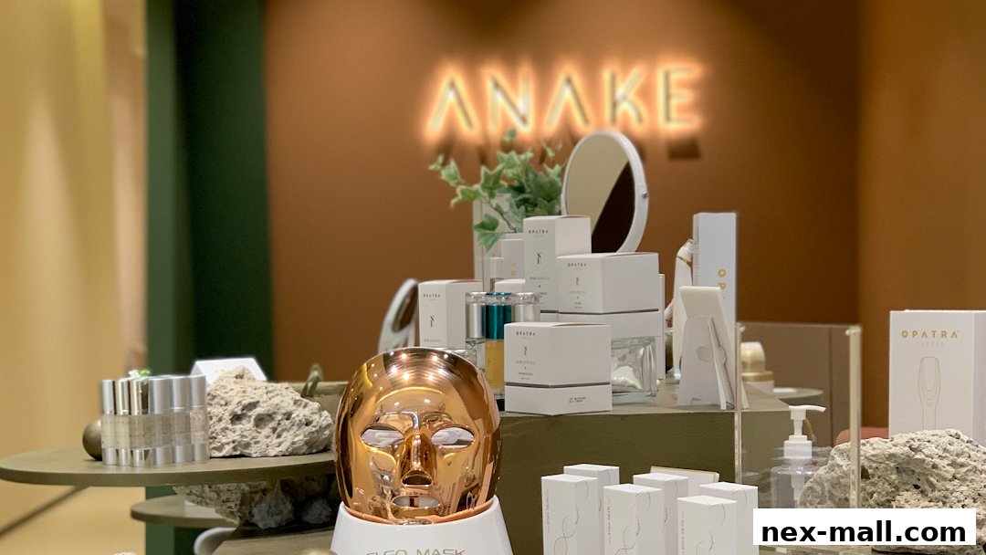 A display of skincare products, including a rose gold LED mask and various branded boxes.