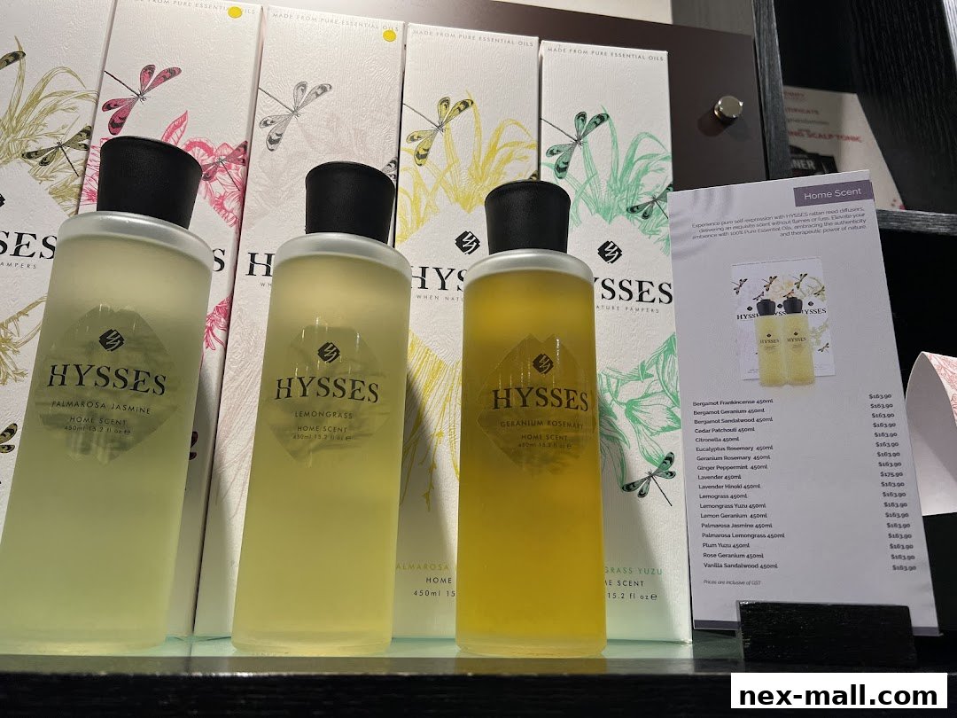 Bottles of home scent diffusers from HYSSES displayed with product information.