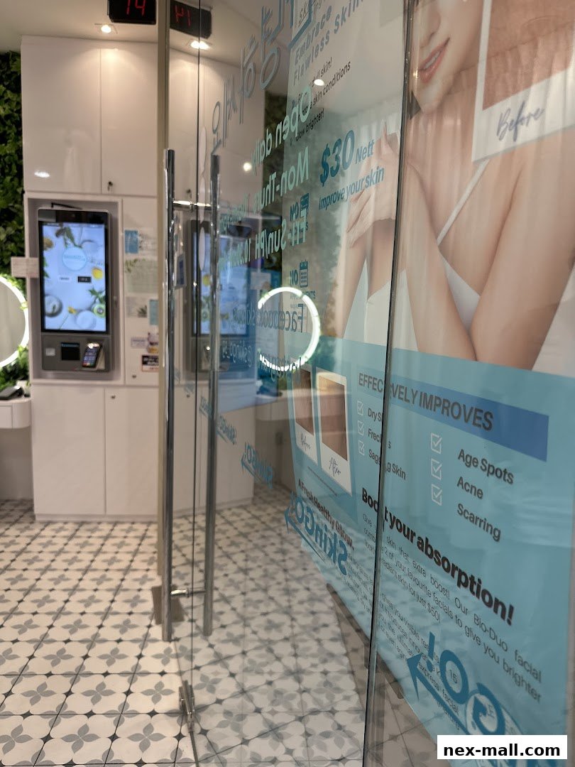 Entrance to SkinGO! with promotional posters and a digital kiosk.