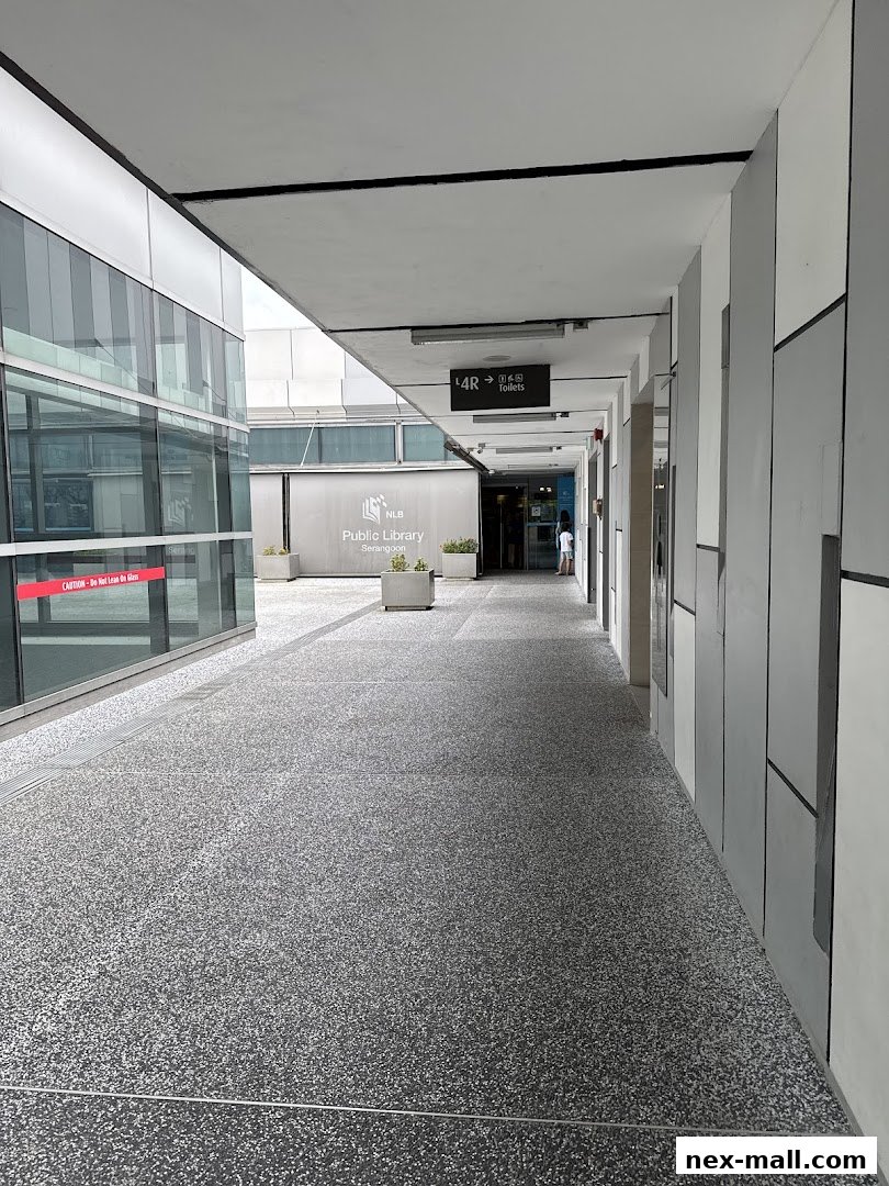 Exterior walkway leading to the entrance of Serangoon Public Library.