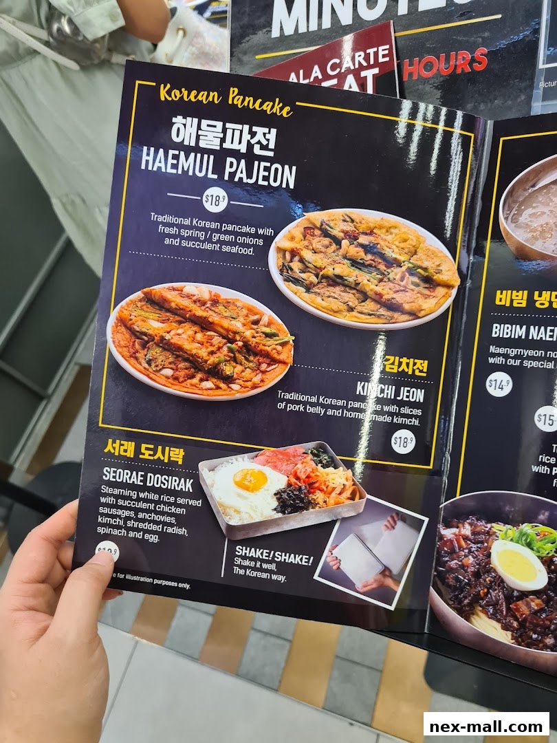 A menu featuring Korean pancakes and a dosirak meal with descriptions and prices.