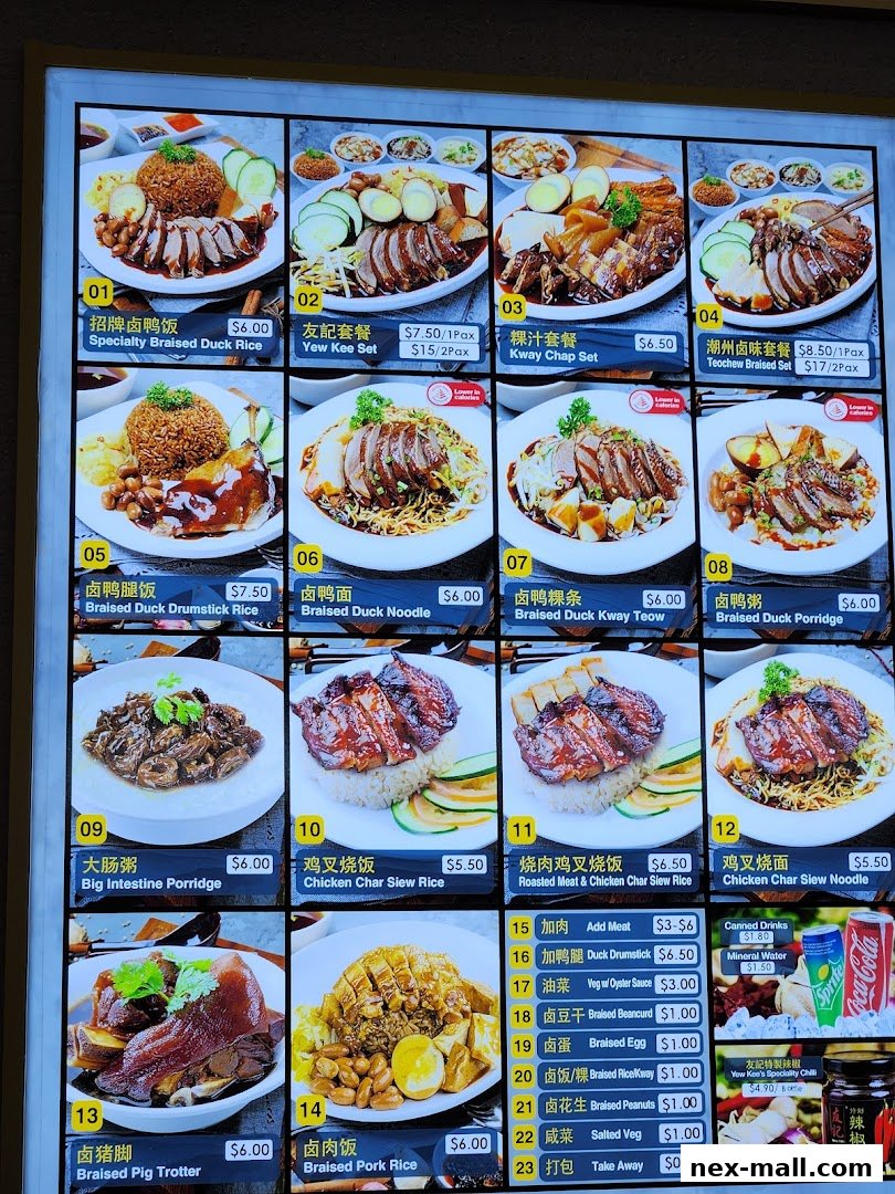 A menu board displaying various braised duck and pork dishes with prices.