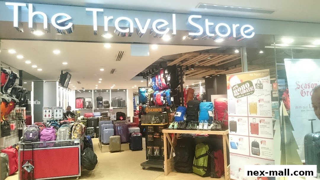 The entrance of 'The Travel Store' showcasing a wide variety of luggage and backpacks.