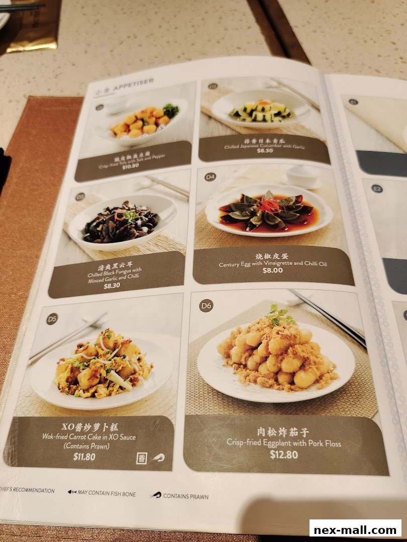 A menu page from Canton Paradise featuring various appetizers with images and prices.