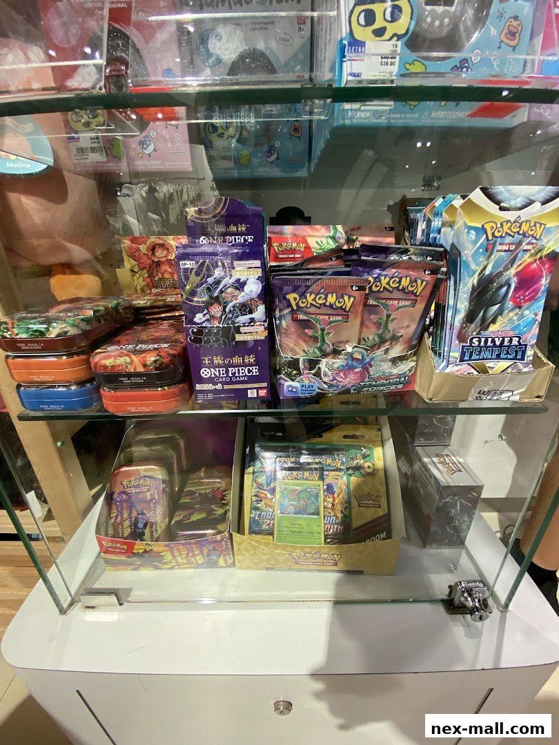 A display case filled with various Pokemon and One Piece trading card game products.