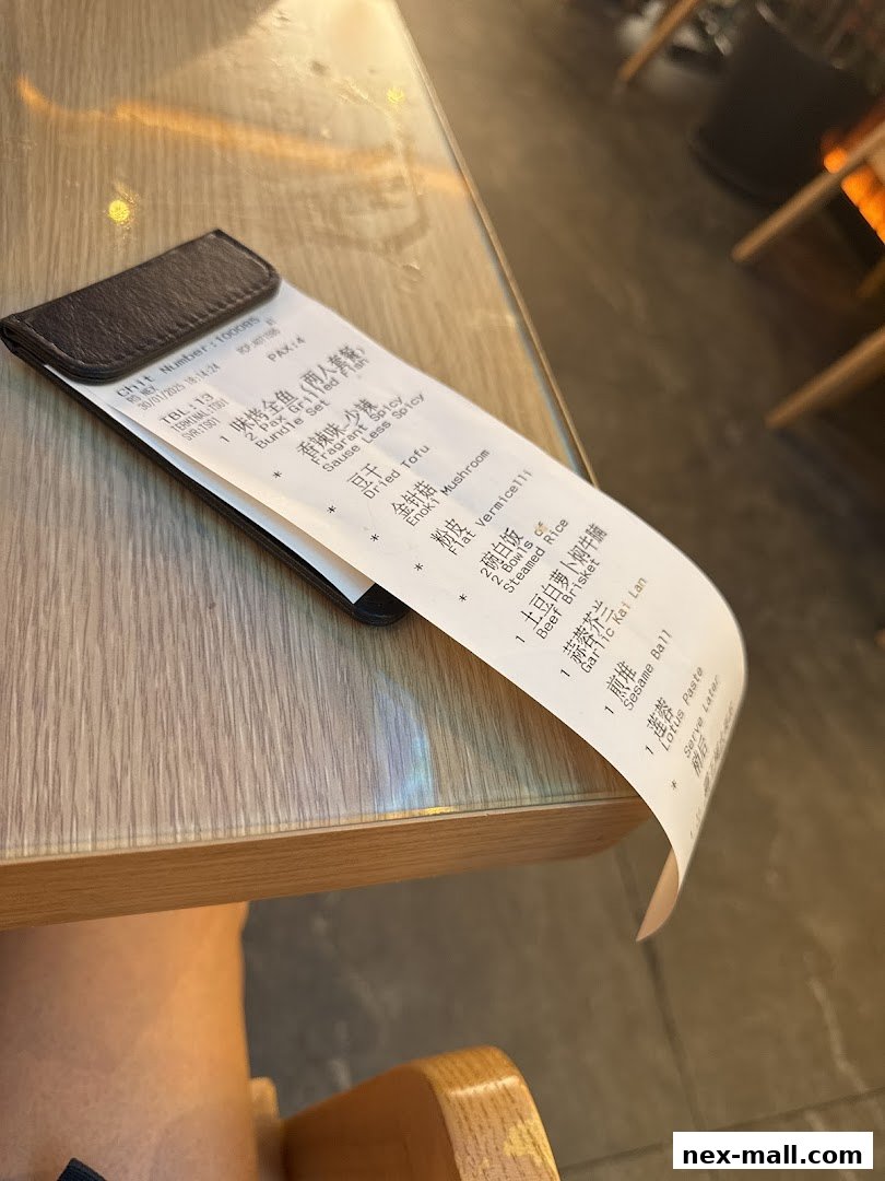 A receipt from Riverside Canton Claypot Cuisine showing various food items and their prices.