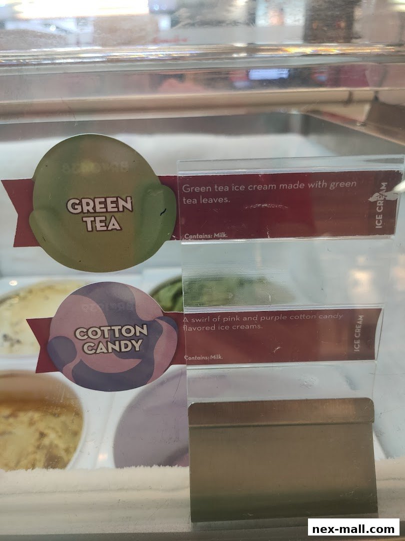Close-up of Baskin-Robbins ice cream flavors: Green Tea and Cotton Candy.