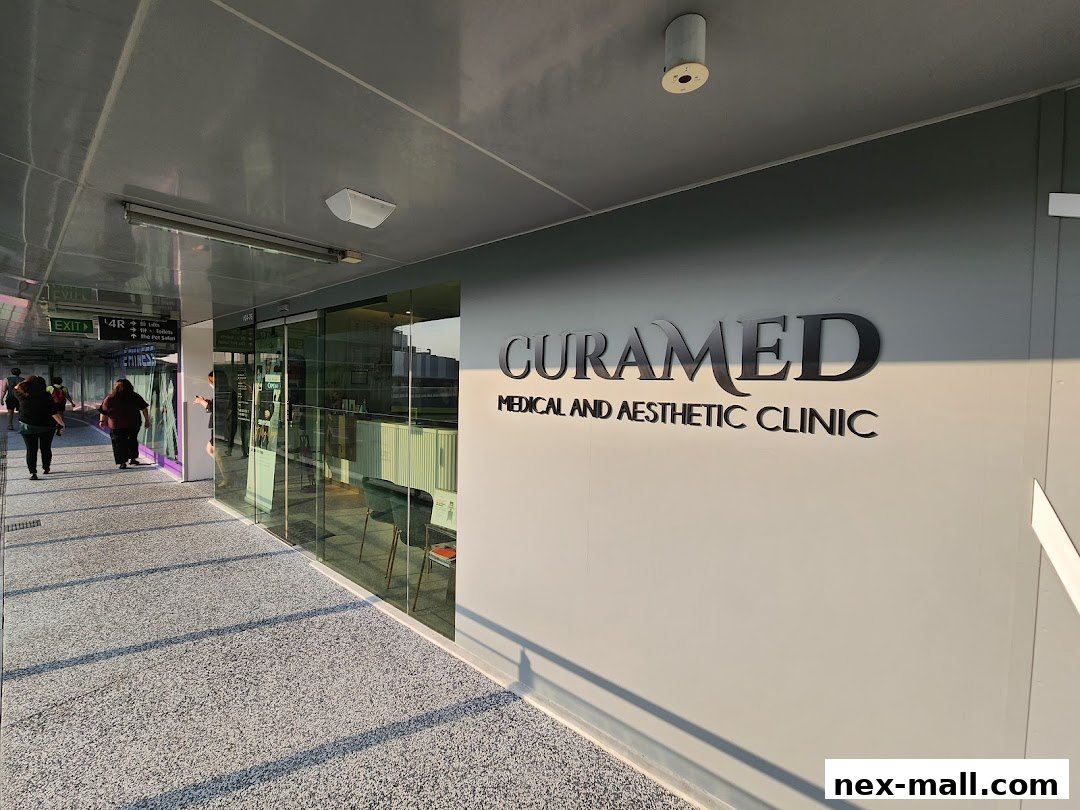 The exterior of CuraMed Medical and Aesthetic Clinic with its prominent signage.