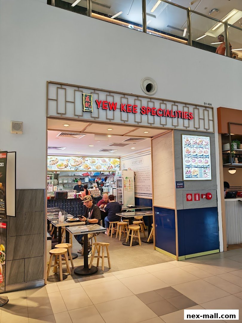 The entrance of Yew Kee Specialities restaurant with customers seated inside.