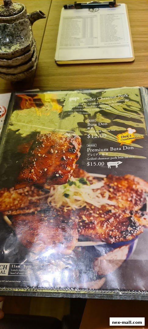 A menu featuring grilled pork dishes with prices and descriptions.
