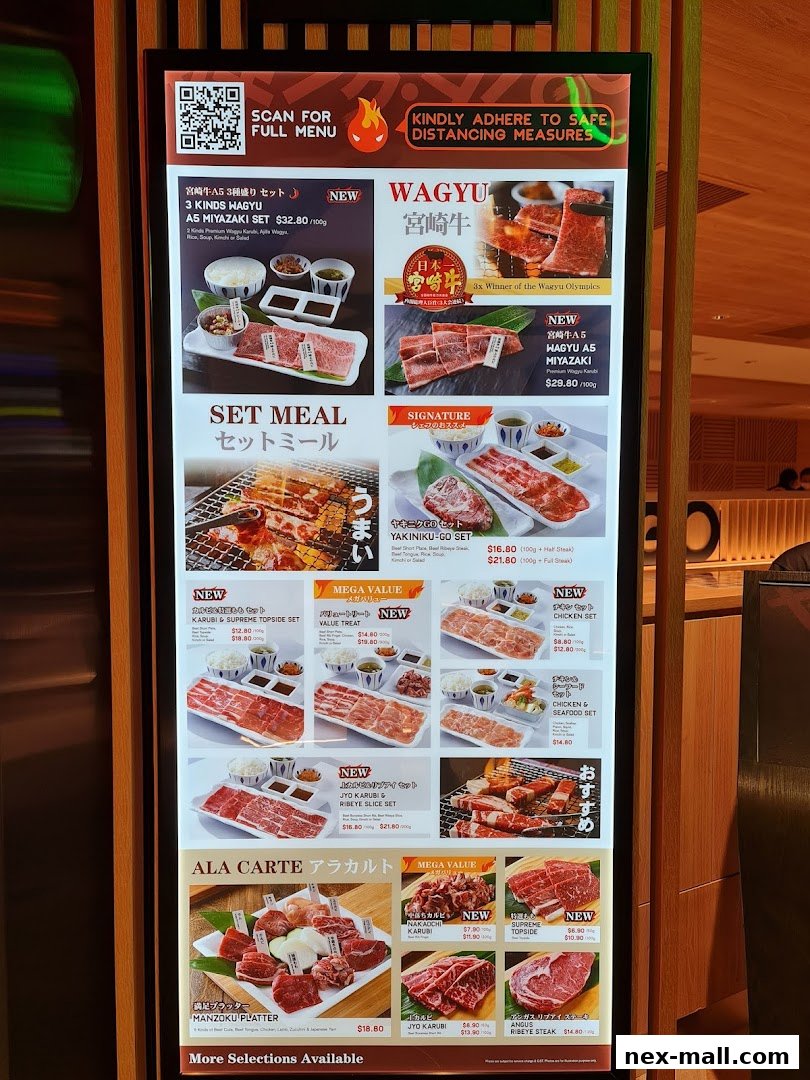 A digital menu board displaying various Japanese Wagyu beef set meals and a la carte options.