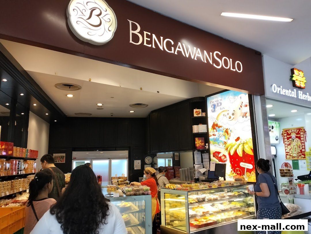 A view of the Bengawan Solo bakery shop with customers browsing pastries.