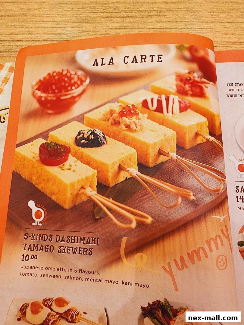 A menu page showcasing five different tamago skewers with various toppings.