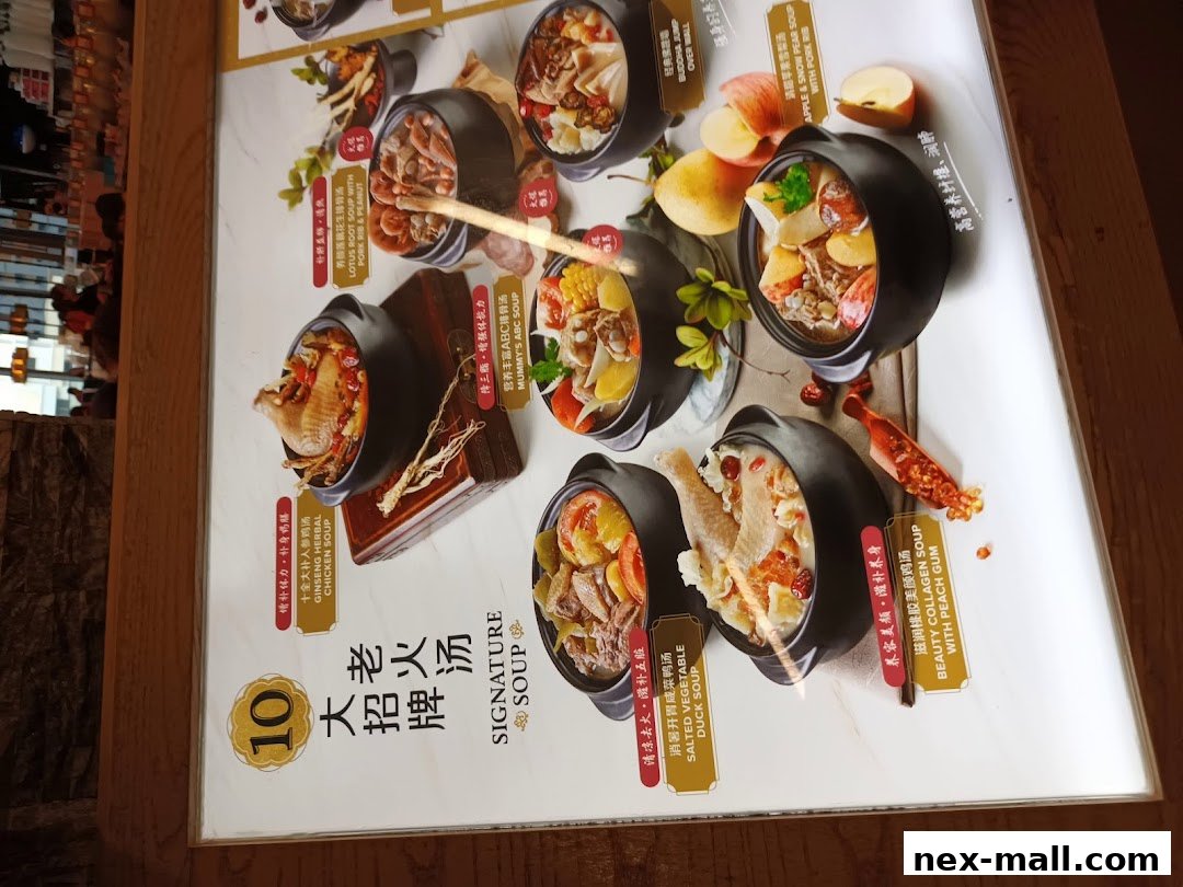 A menu board displaying various signature soups with appetizing images and descriptions.