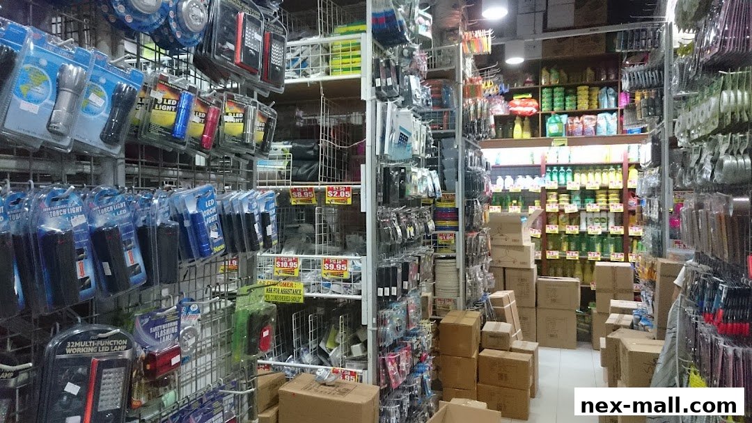 A retail store aisle filled with various products like flashlights, cleaning supplies, and other household items.