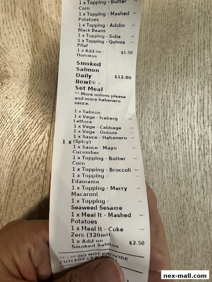 A receipt from Stuffd showing a detailed order with various toppings and meals.