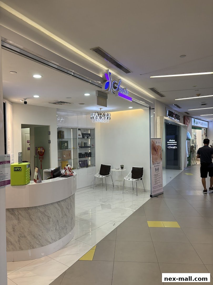 The entrance of Spacio, a beauty or wellness clinic, with a reception desk and seating area.