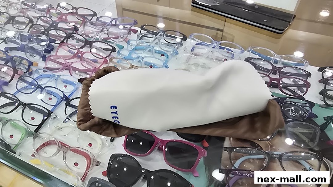 A display of various eyeglasses and sunglasses in a retail store.