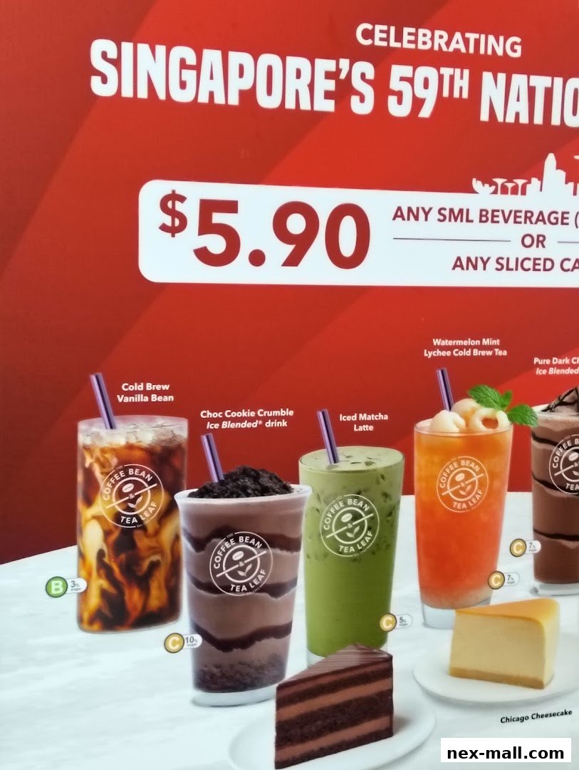 A promotional display for The Coffee Bean & Tea Leaf, featuring beverages and desserts.