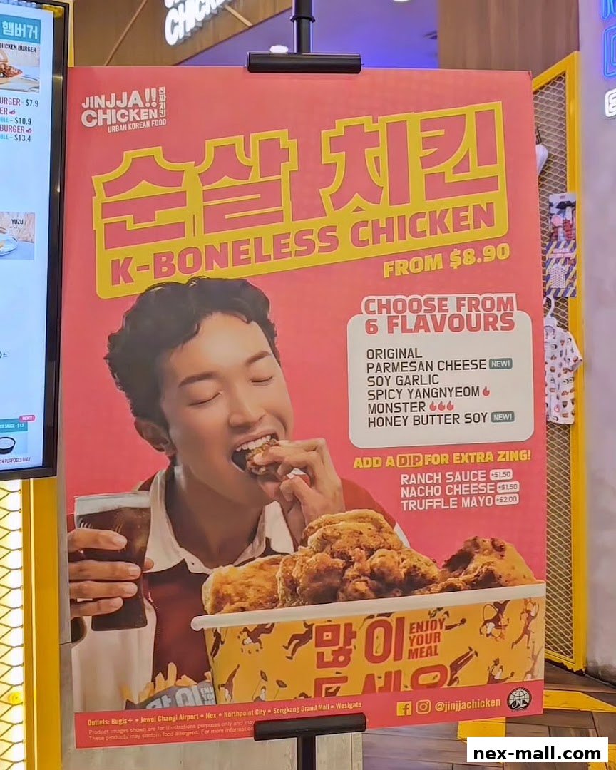 A poster advertising JINJJA Chicken's K-Boneless Chicken with various flavors and dips.