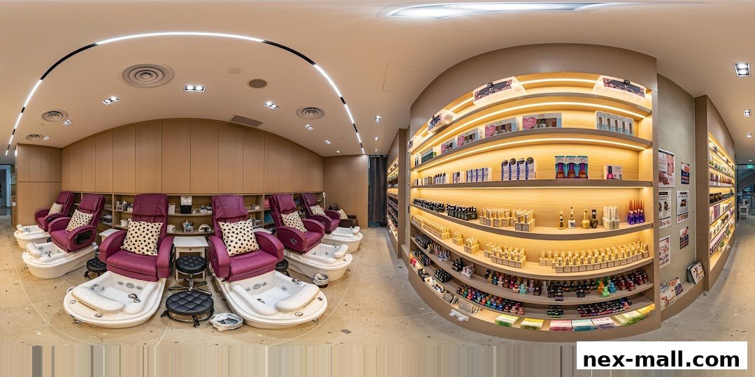 Interior of a nail spa with pedicure chairs and shelves stocked with nail polish and beauty products.