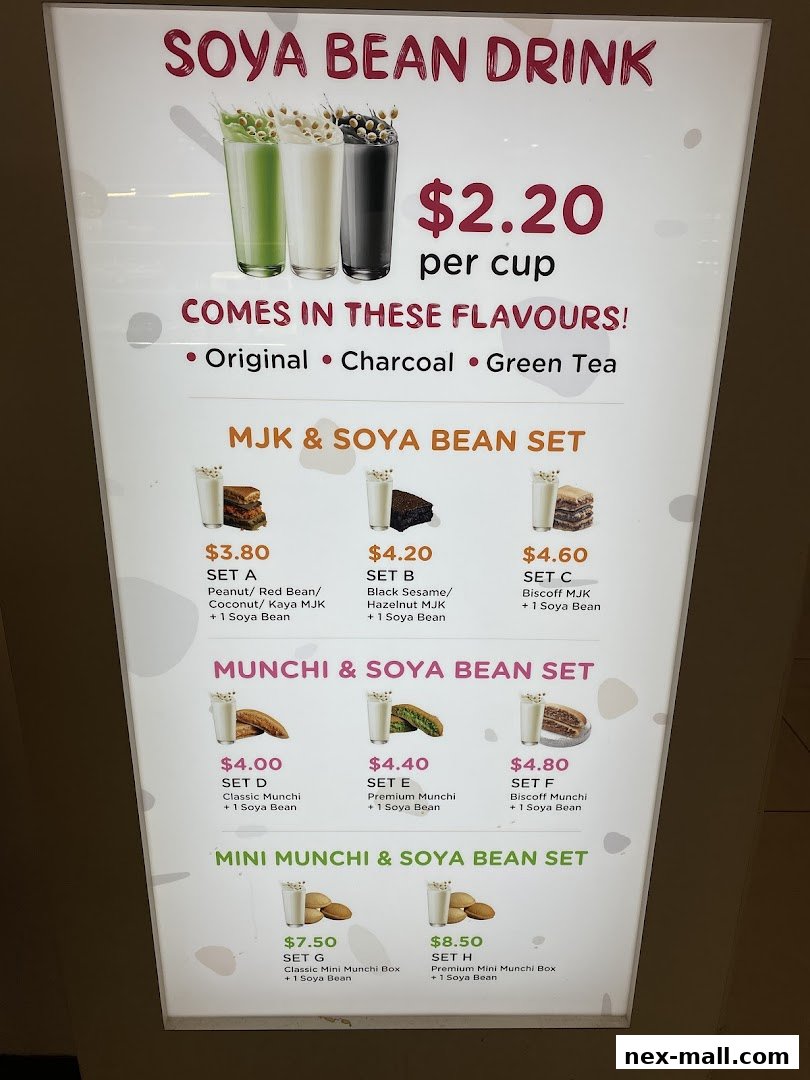 A menu board displaying various soya bean drinks and sets with prices.