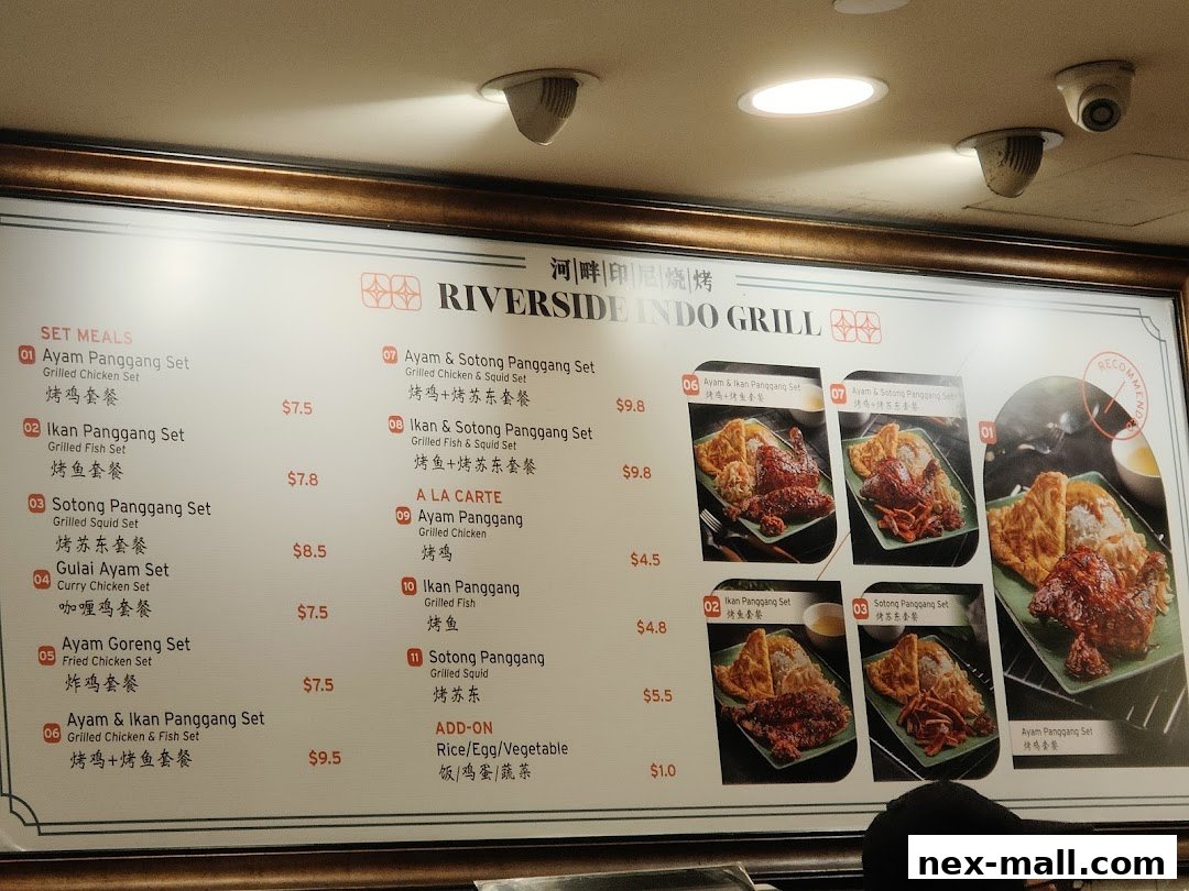 A menu board for Riverside Indo Grill featuring various set meals and a la carte options.