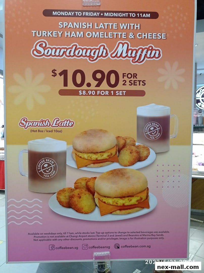 A promotional poster for The Coffee Bean & Tea Leaf featuring a Spanish Latte with Turkey Ham Omelette & Cheese Sourdough Muffin.