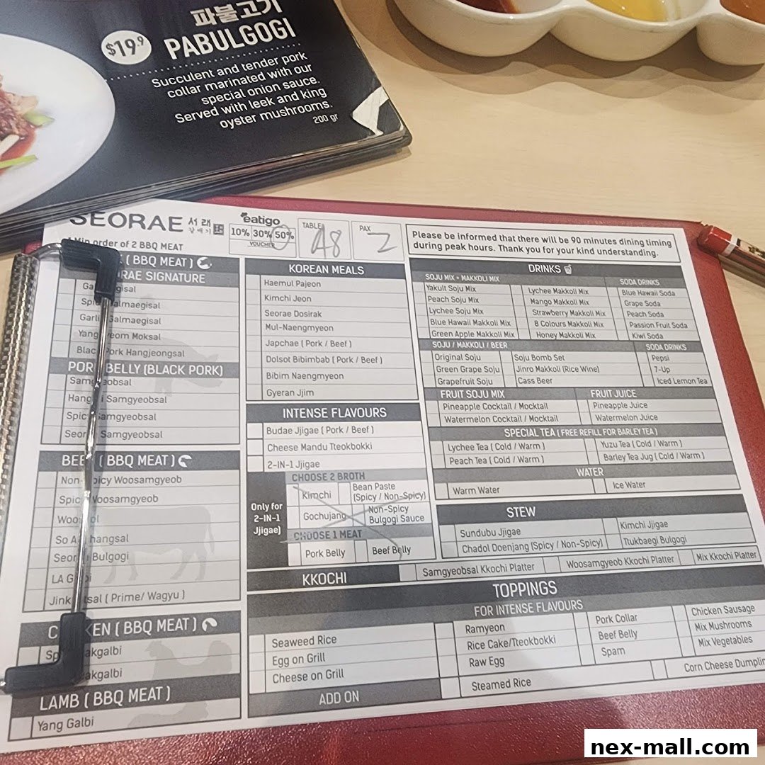 A menu for Seorae Jib Nex, featuring Korean meals, drinks, stews, and toppings.