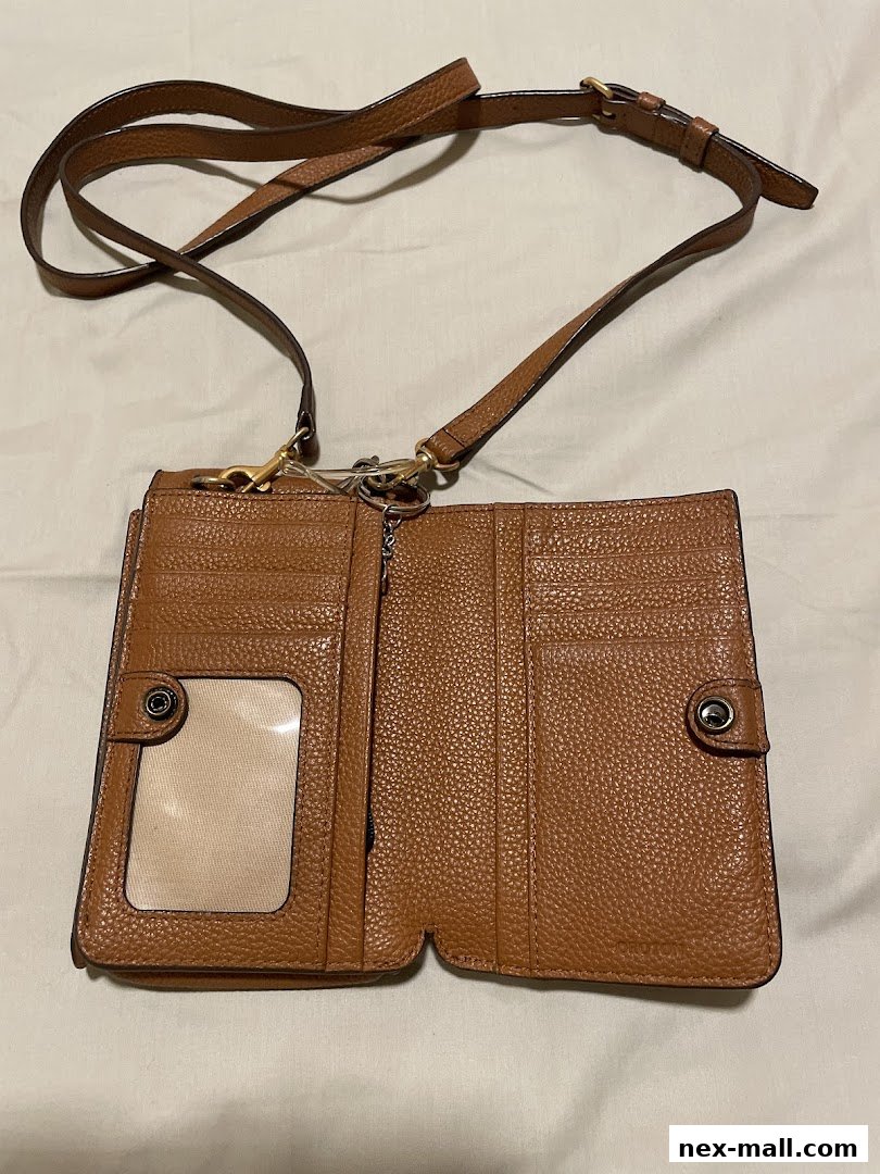 A brown leather wallet with a long strap and multiple card slots.