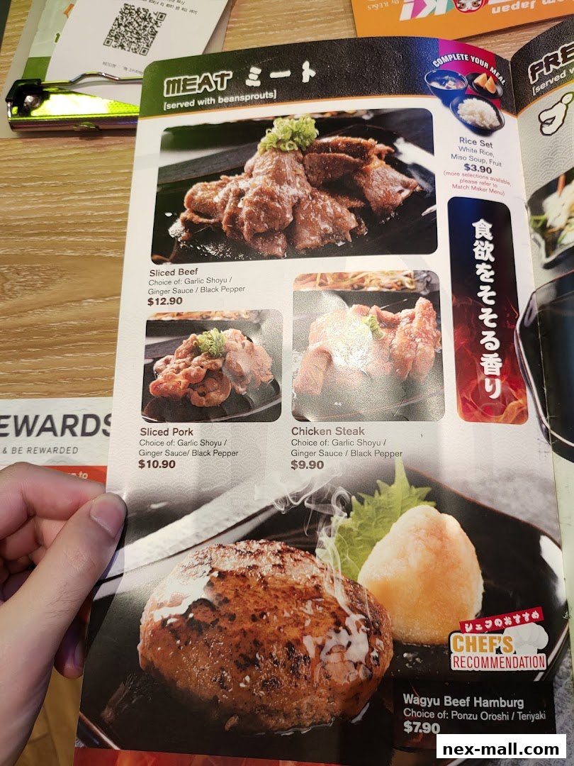 A menu page from Yaki Yaki Bo NEX featuring meat dishes like sliced beef, pork, chicken steak, and wagyu beef hamburg.