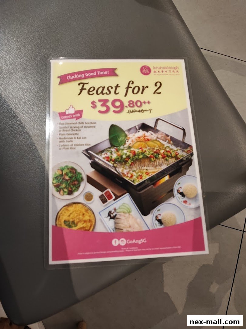A menu flyer for Go-Ang Pratunam Chicken Rice featuring a 'Feast for 2' promotion.