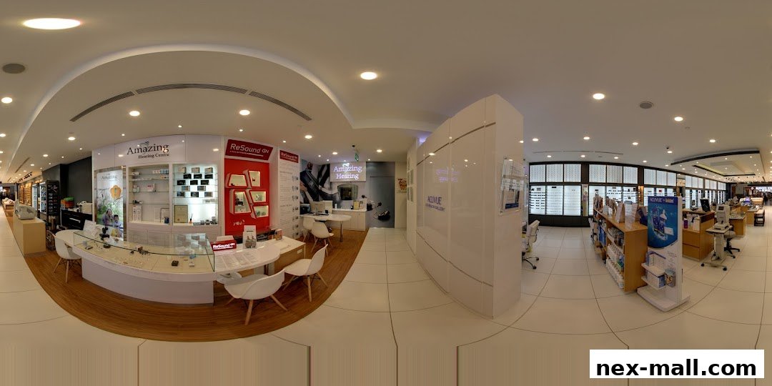 Interior view of an optical shop showcasing eyewear displays and consultation areas.