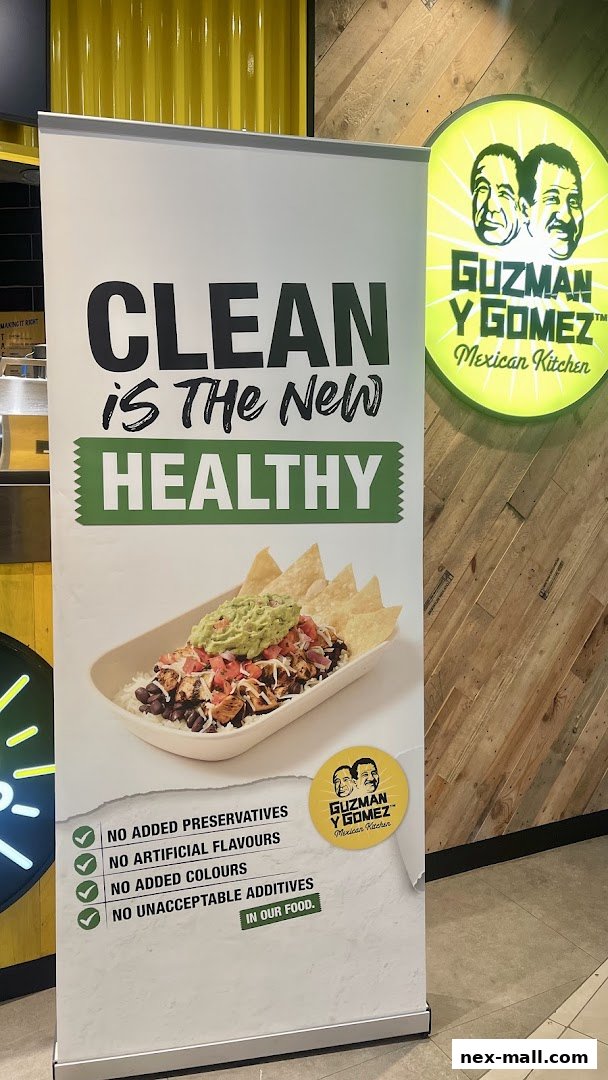 A Guzman y Gomez promotional banner highlighting their commitment to clean and healthy food.