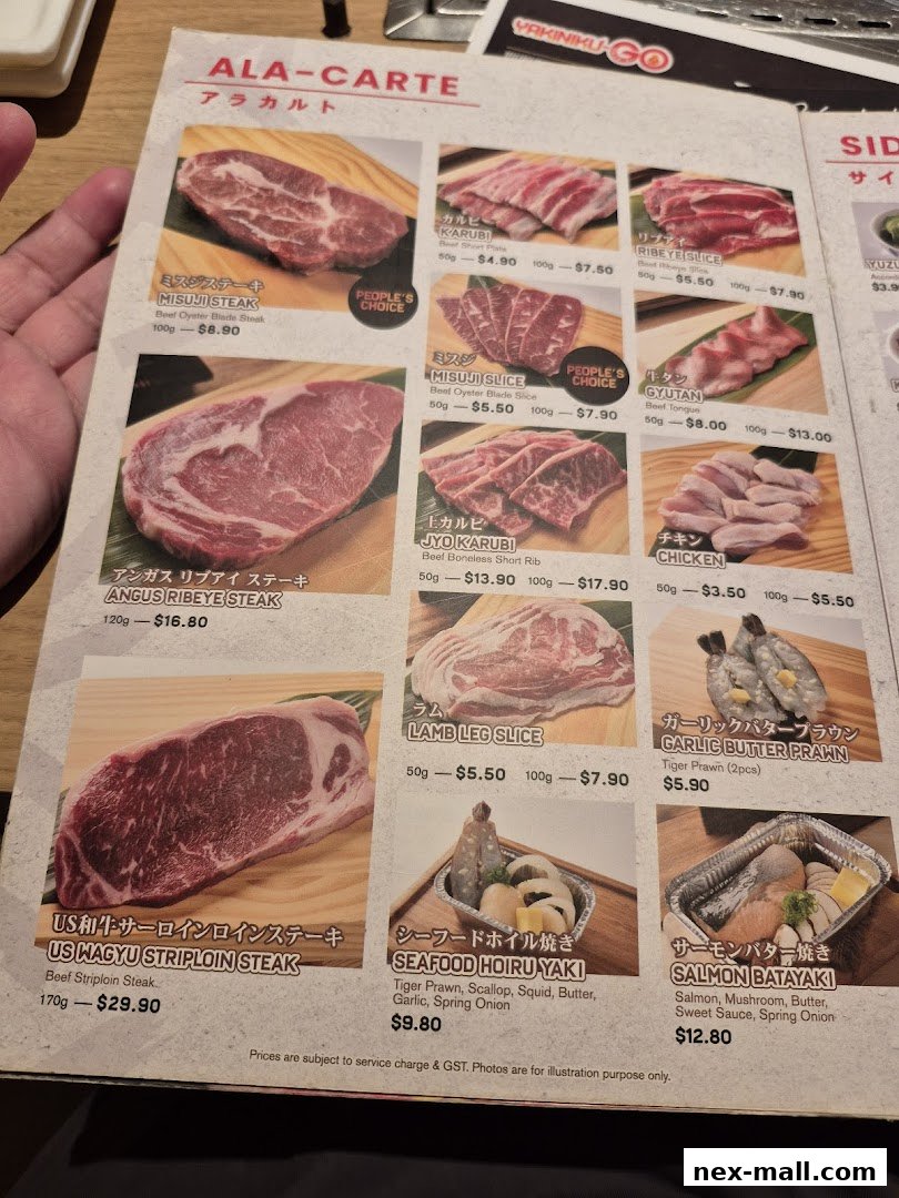 A menu from Yakiniku-GO NEX featuring various cuts of beef, chicken, lamb, and seafood.