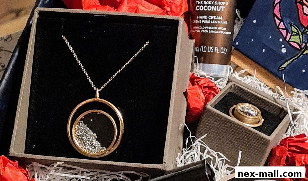 A gift box containing a necklace, a ring, and hand cream.