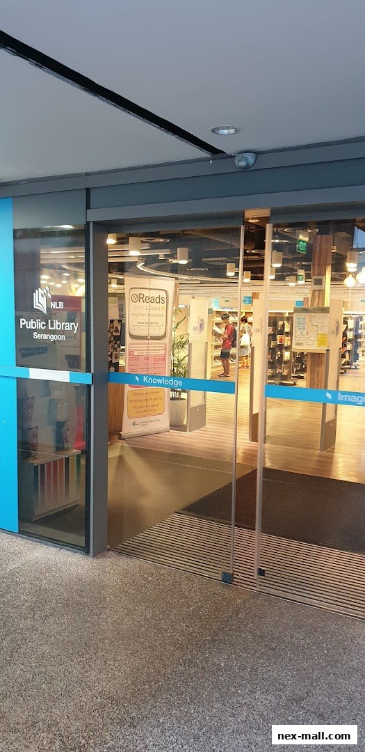 The entrance to Serangoon Public Library with glass doors and signage.