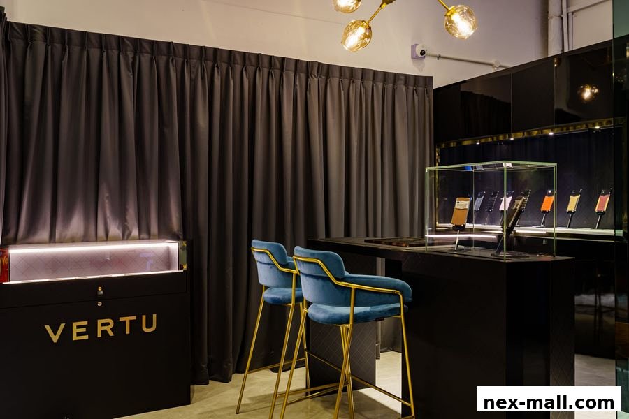 Interior of a modern shop with display cases, seating, and elegant lighting.