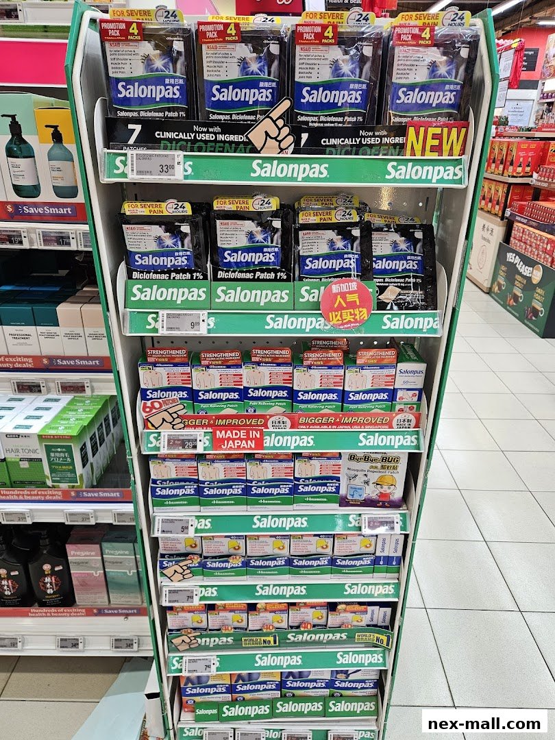A display of Salonpas pain relief patches in various sizes and packaging.
