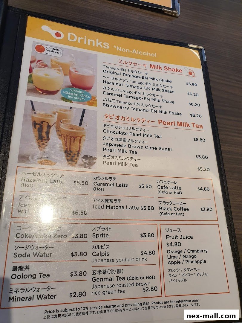 A menu page displaying various non-alcoholic drinks, including milkshakes, pearl milk teas, lattes, and juices.