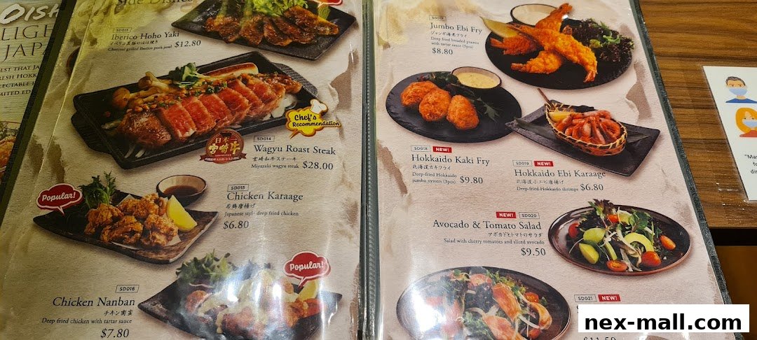 A menu from Aburi-EN Nex featuring various Japanese dishes like Wagyu Roast Steak and Chicken Karaage.