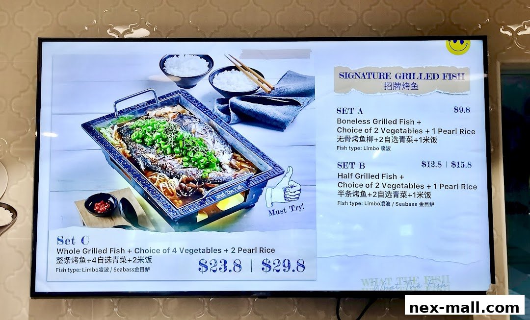 A digital menu displays signature grilled fish sets with prices and descriptions.