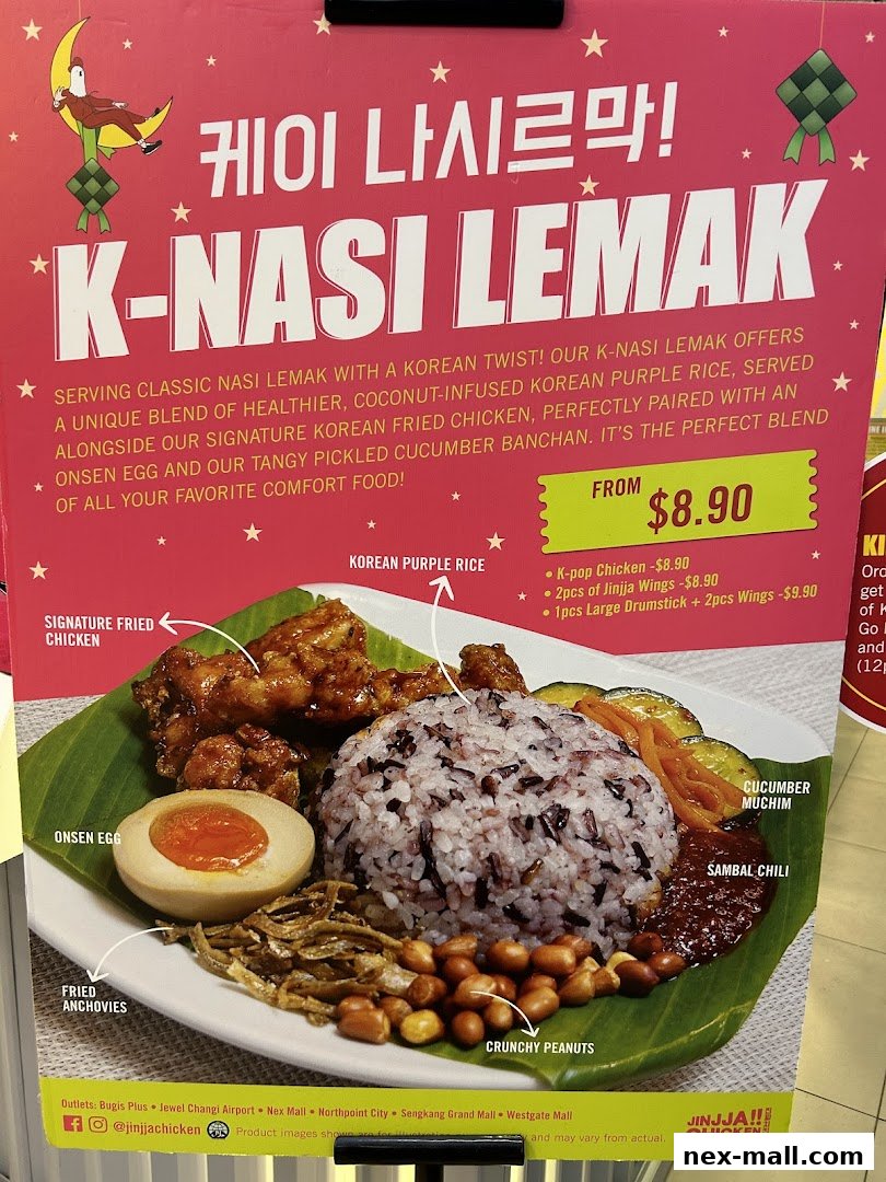 A promotional poster for JINJJA Chicken's K-Nasi Lemak, showcasing the dish and its components.