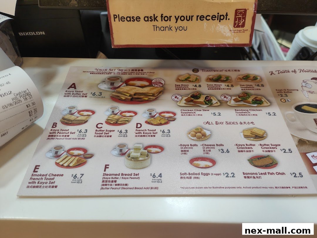 A menu from Ya Kun Kaya Toast featuring various set meals, toastwiches, and all-day sides.