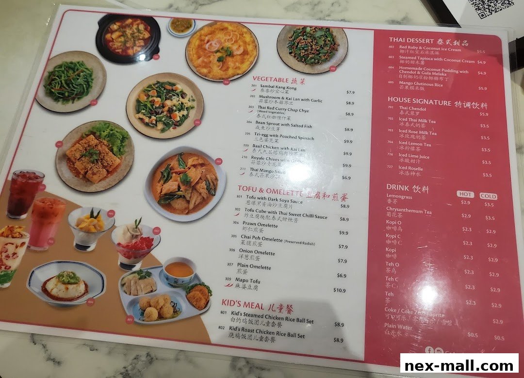 A menu from Go-Ang Pratunam Chicken Rice featuring various Thai dishes, drinks, and kids' meals.
